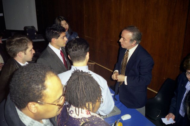Speaking with attendees after a presentation