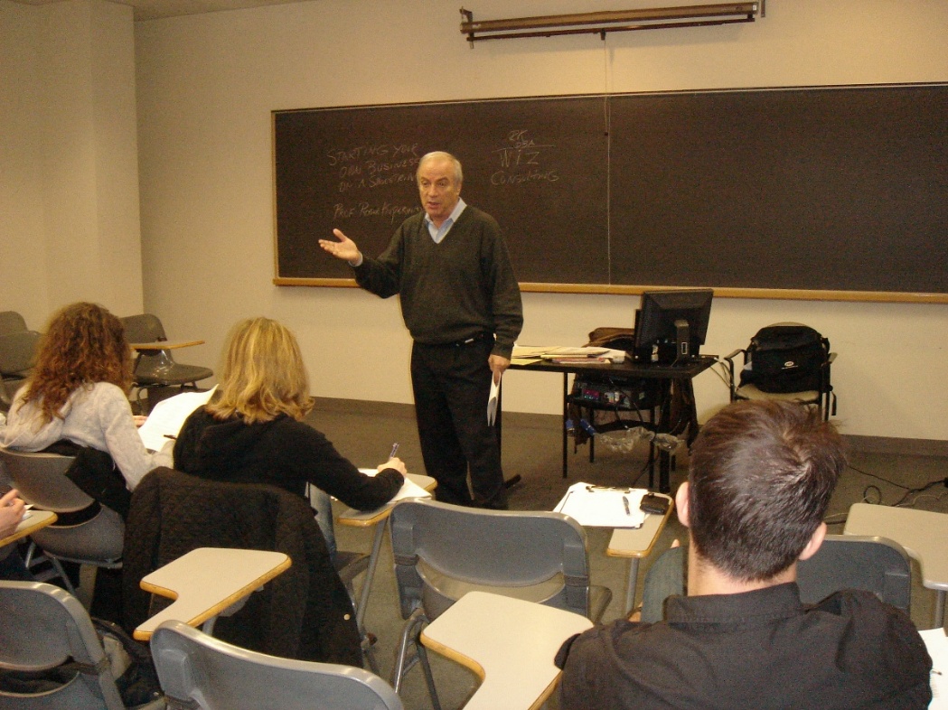 In the classroom — sharing experience with students.